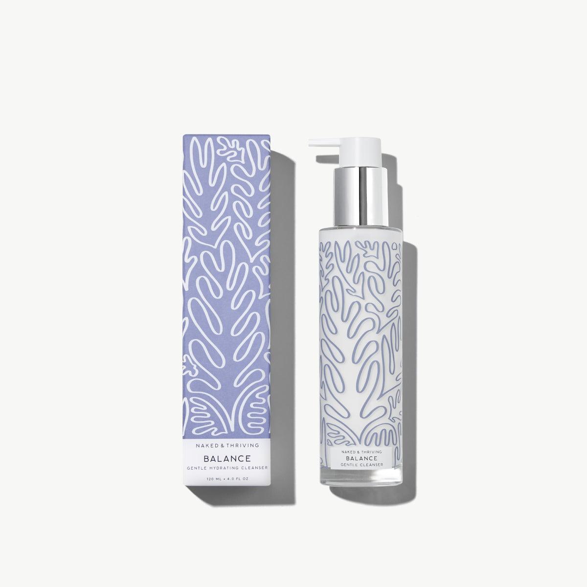 Naked & Thriving Balance Gentle Hydrating Cleanser in a clear glass bottle with botanical-patterned bottle and brand label 
