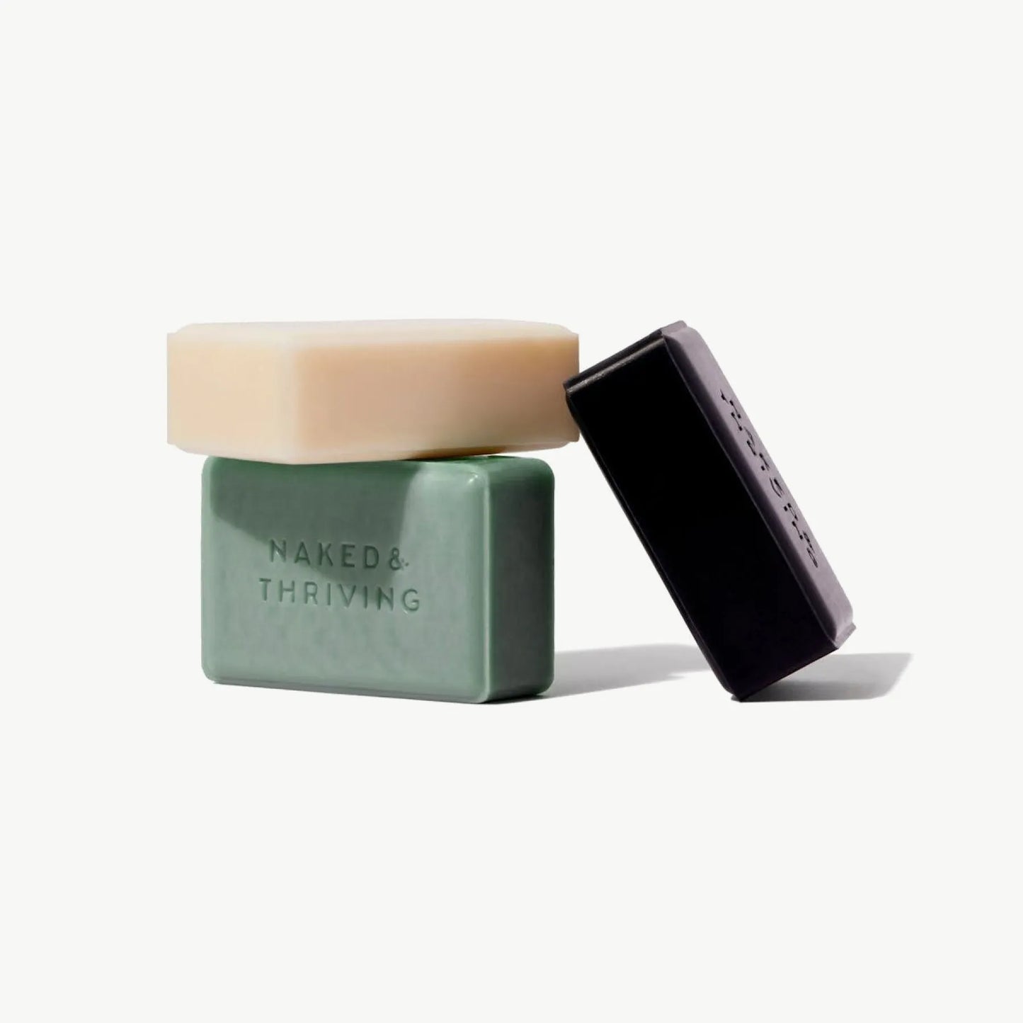 Cleansing Bars Trio with Soothe, Purify, and Exfoliate bars on white background