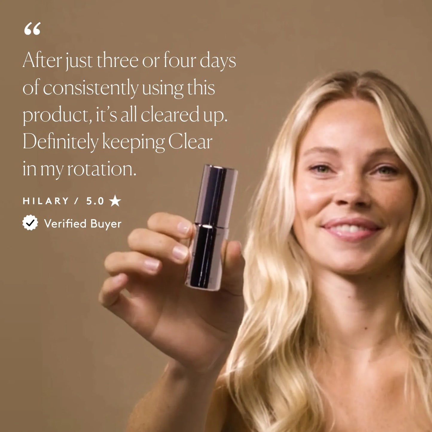 
                
                  Woman holding Clear Gel bottle with visible customer review text
                
              