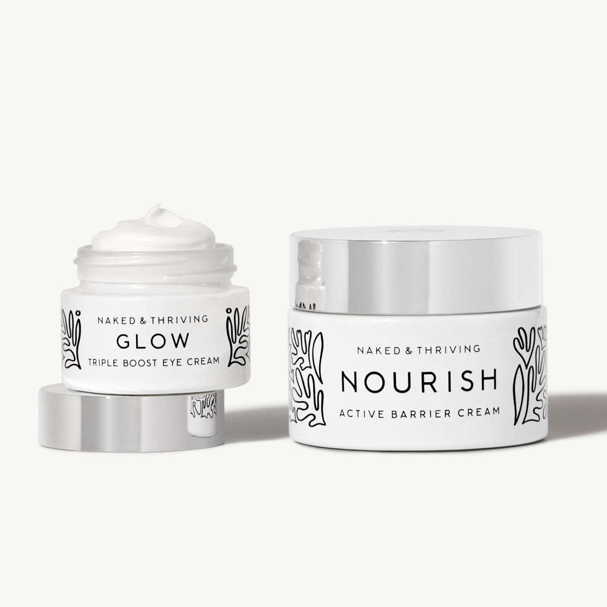 Naked & Thriving Daily Essentials Duo with Glow Triple Boost Eye Cream and Nourish Active Barrier Cream in white jars
