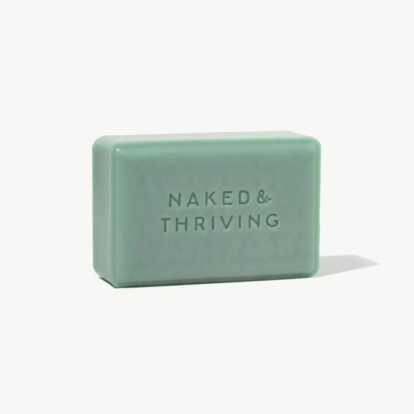 Green Exfoliate Clay Cleansing bar by Naked & Thriving displayed on white background