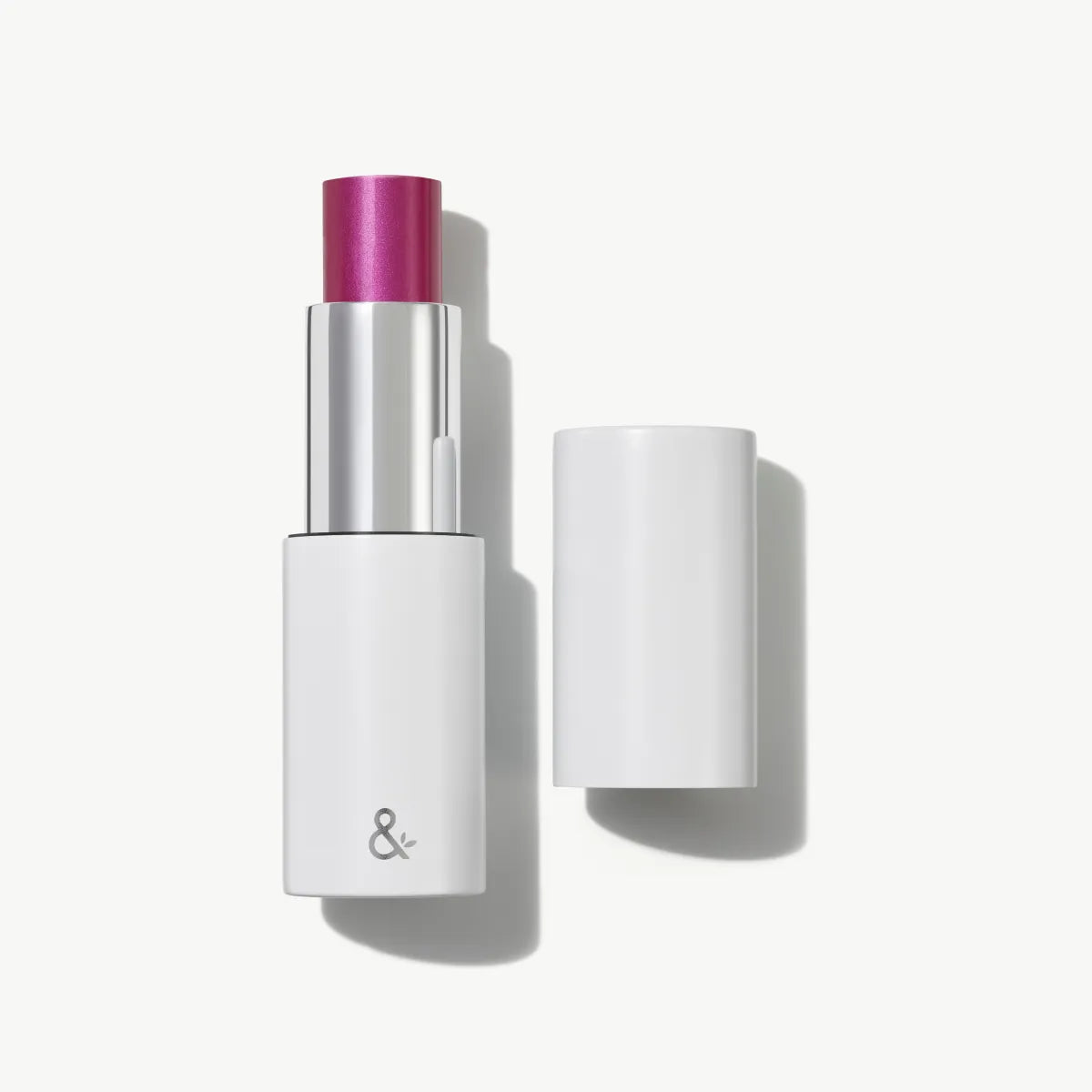HydraTint multi-stick (Wild tint) with cap removed showing plum-colored balm