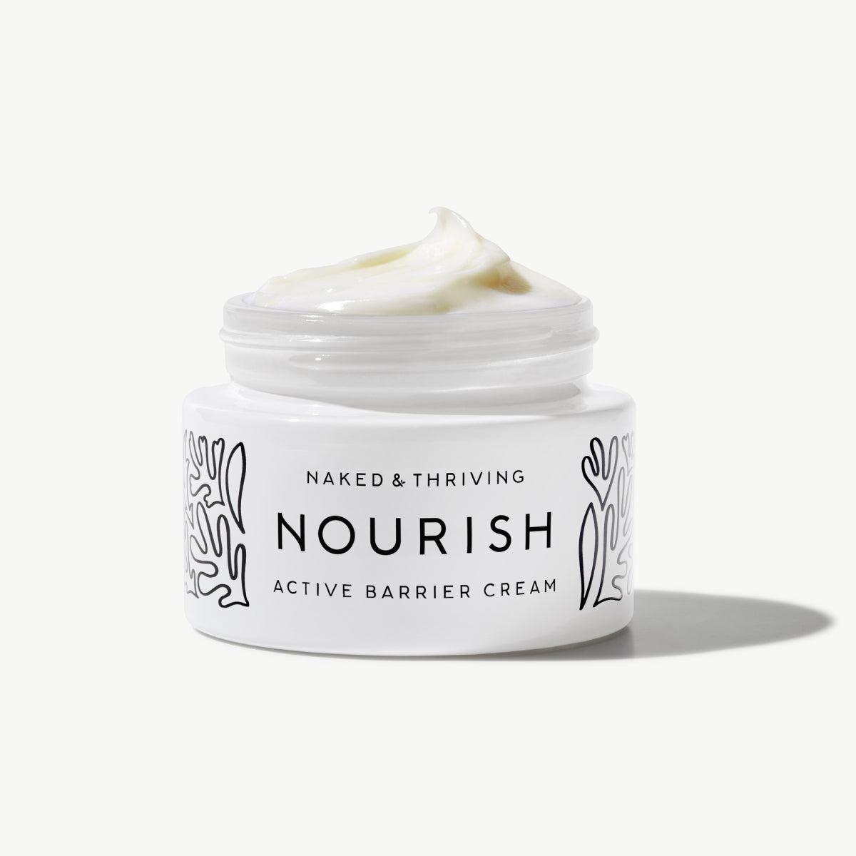 Naked & Thriving Nourish Active Barrier Cream in white glass cream jar with brand label
