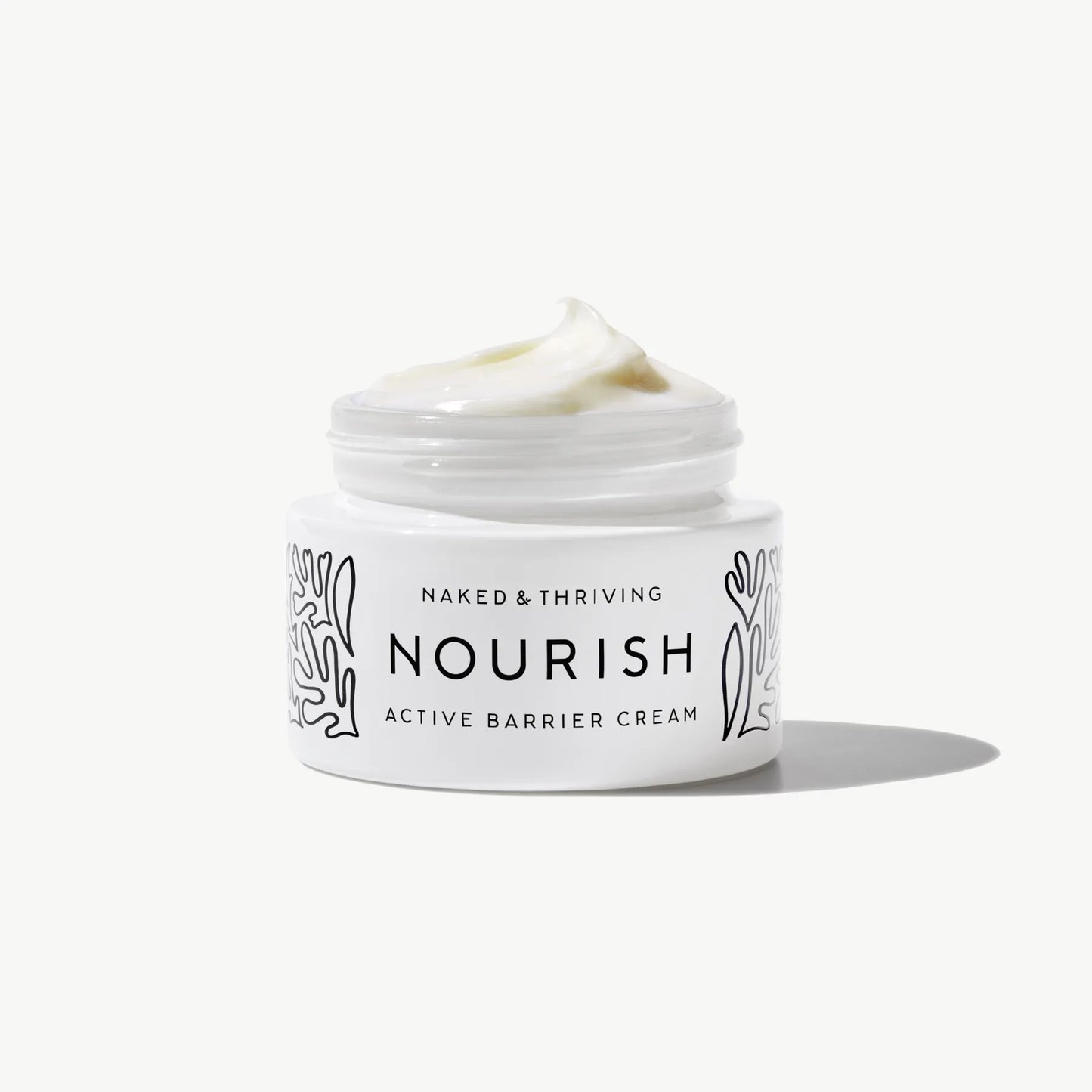 Open jar of Nourish Active Barrier Cream with white cream texture on a neutral background