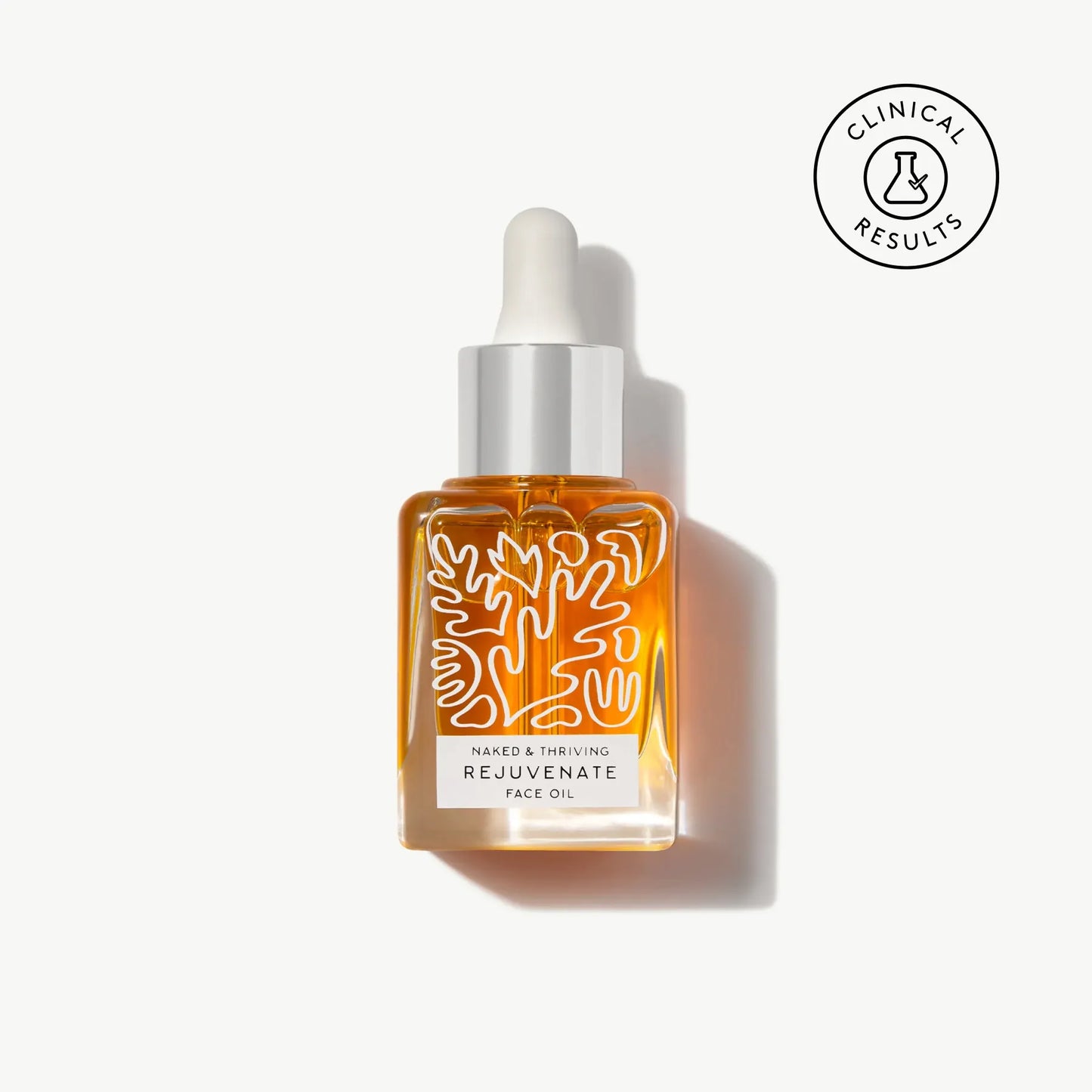 Full-size bottle of Rejuvenate Restorative Face Oil with visible clinical results badge