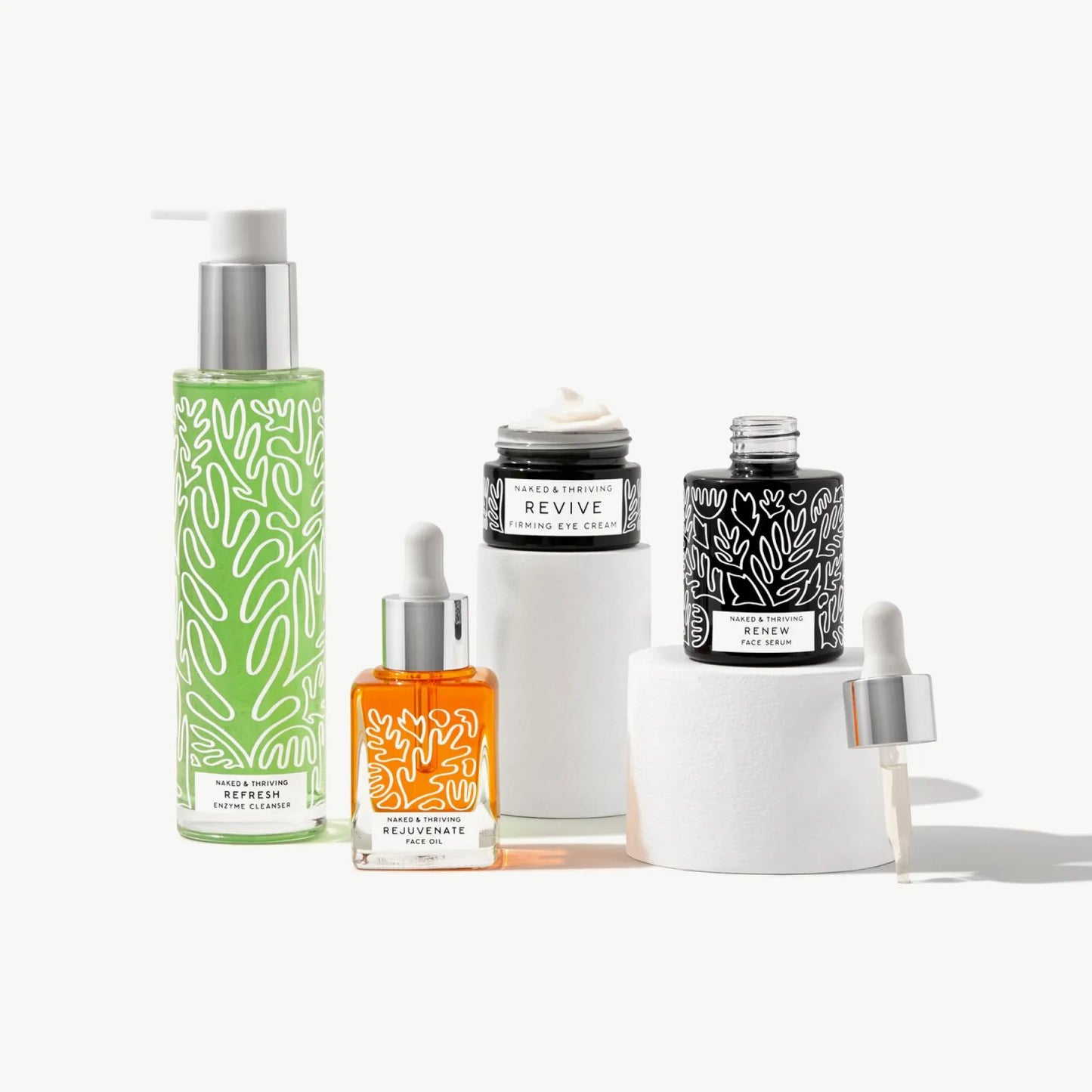 Reset Routine with Refresh cleanser, Renew serum, Revive eye cream, and Rejuvenate Oil