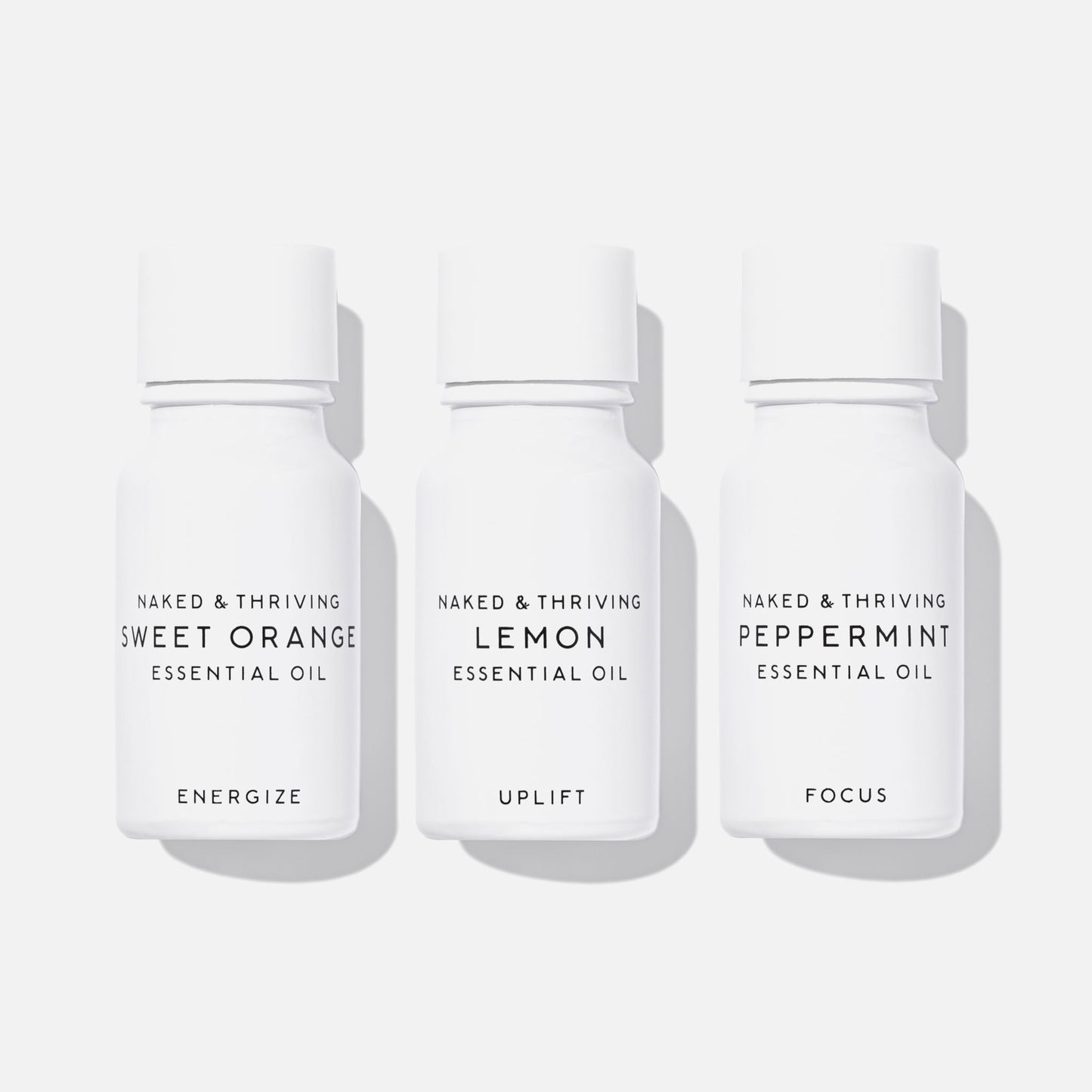 Essential oil trio including sweet orange, lemon, and peppermint